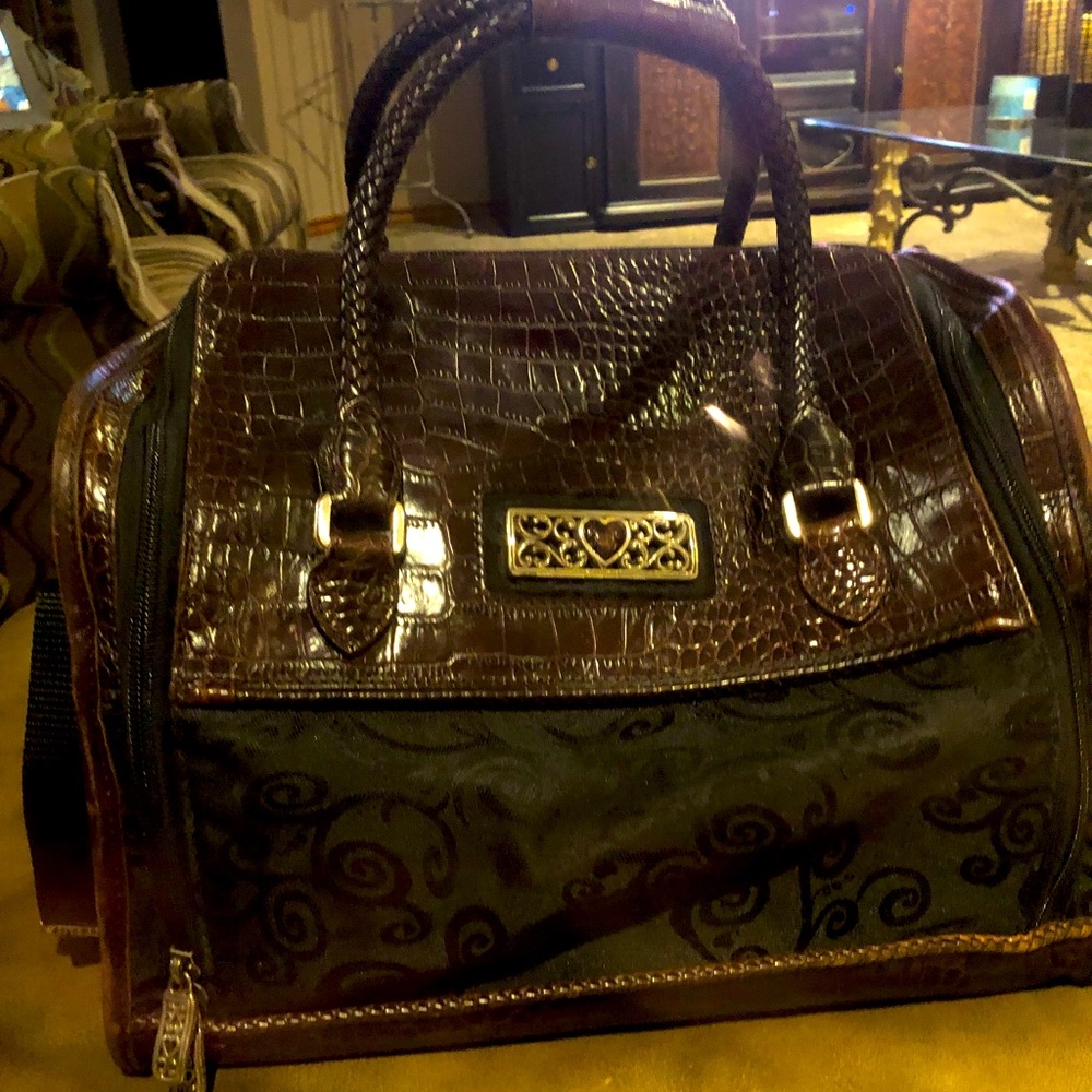 Brighten make up traveler.  All leather with silver  trimmings.